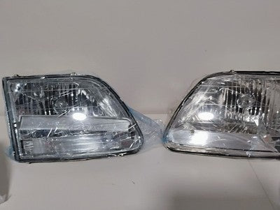 97-03 Expedition 97-03 Ford F150 Chrome Headlights Headlamps Set  FLAWED READ